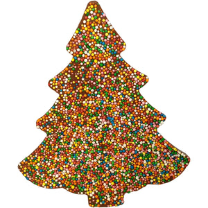 Christmas tree-shaped chocolate covered with colourful sprinkles on a white background.